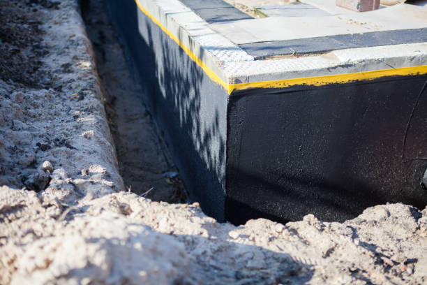 Professional Waterproofing technician working in Medway, OH